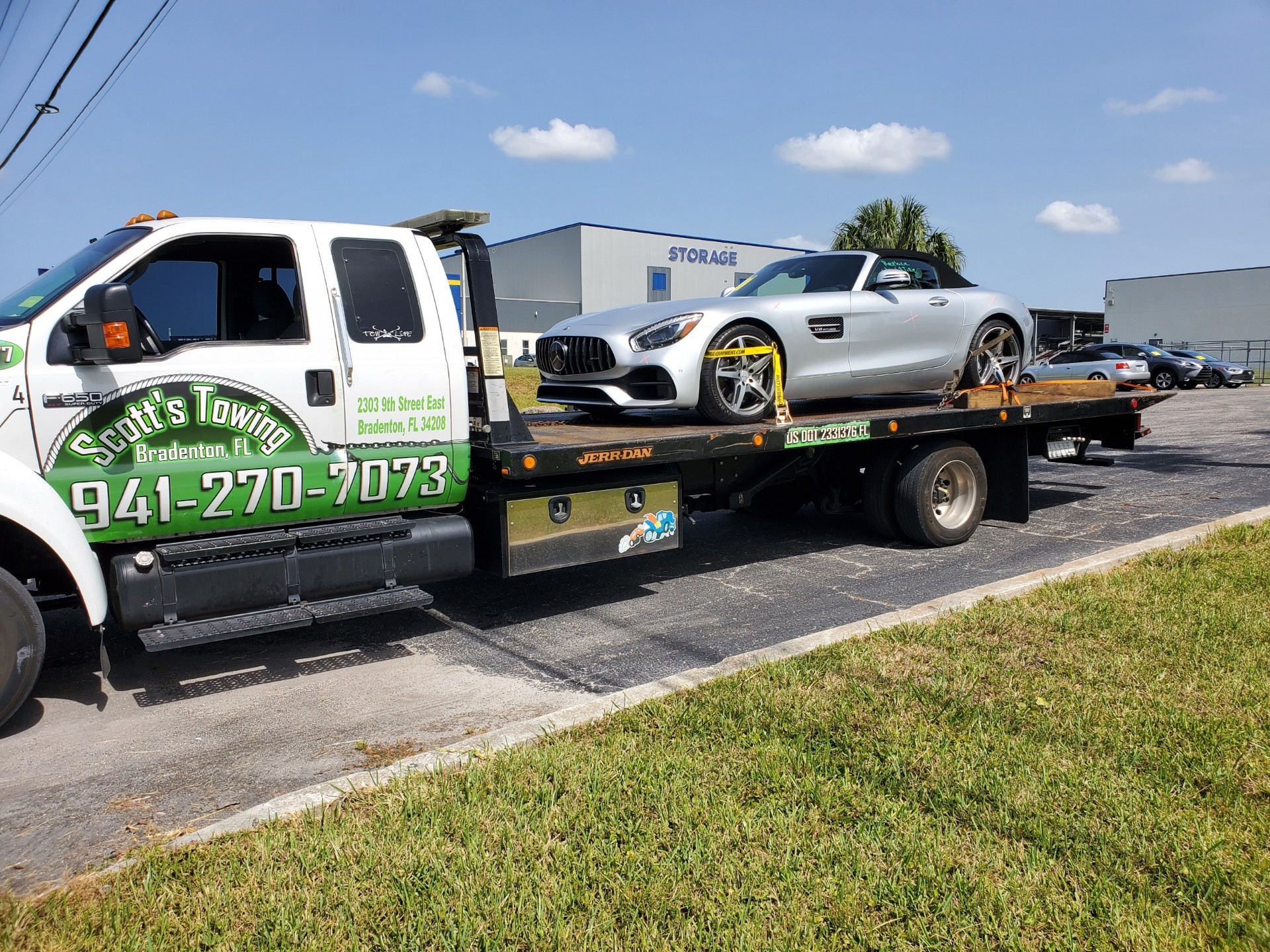 Scott's Towing flatbed with Mercedes AMG sports car