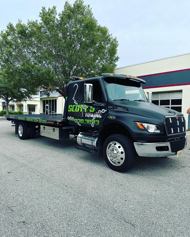 Scott's Towing large flatbed truck